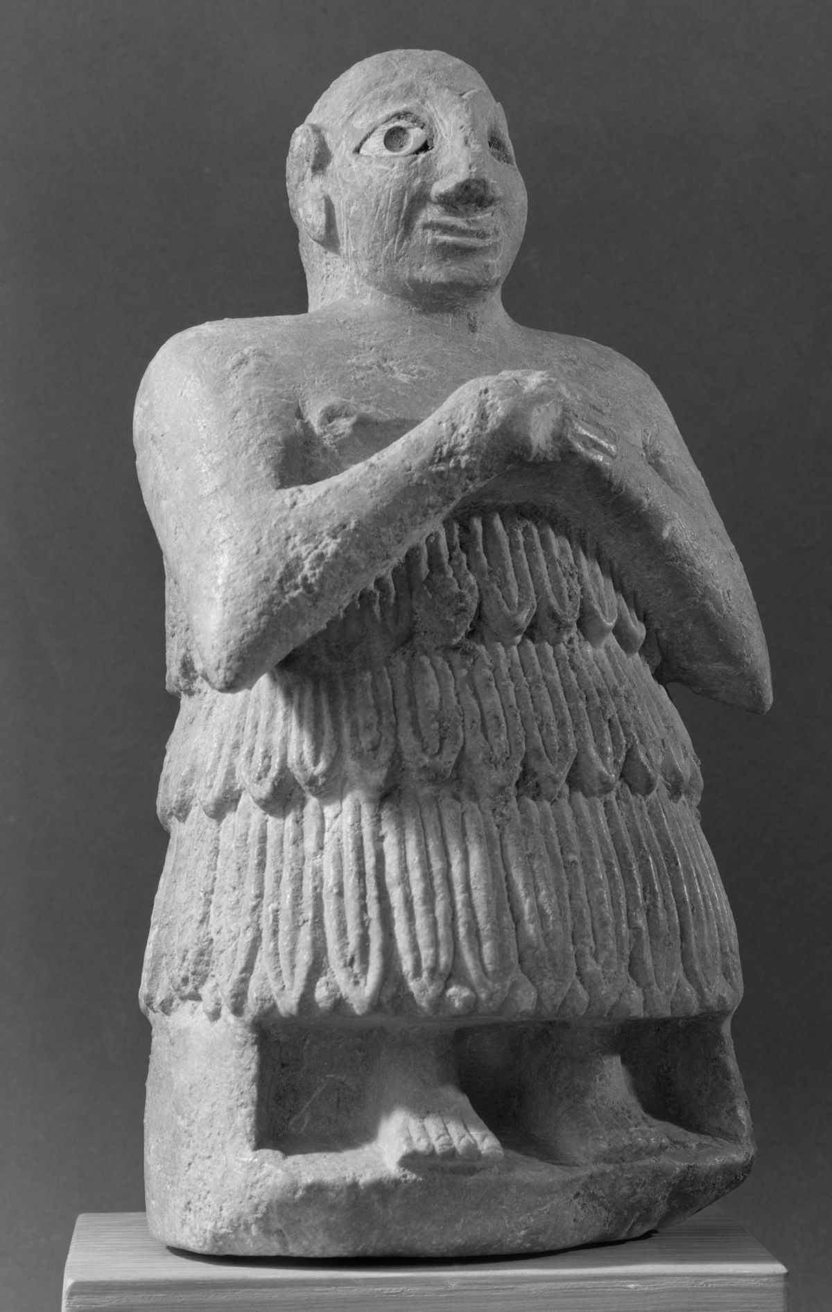 Orant aux mains jointes