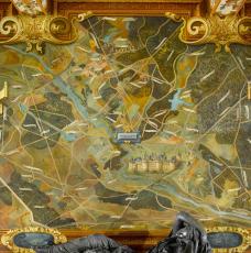 Le roi Henri IV confie à Louis Poisson divers travaux au château de Fontainebleau, dont le décor de la Galerie des Cerfs: 13 vues cavalières de domaines et châteaux royaux (Saint-Germain-en-Laye, Chambord, Amboise*, Villers-Cotterêts,…). Sur chaque fresque, un cartel indique la superficie de la forêt. L’ensemble a été restauré à l’époque de Napoléon III.