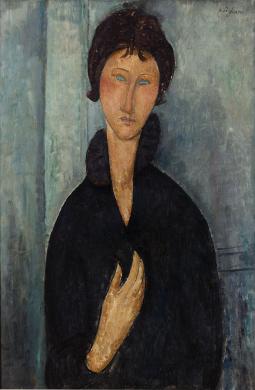 Portrait de femme aux yeux bleus avec un manteau noir