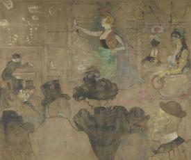 des spectateurs de dos regardent une danseuse