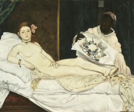 une femme nue allongée avec un chat noir et une servante avec un bouquet