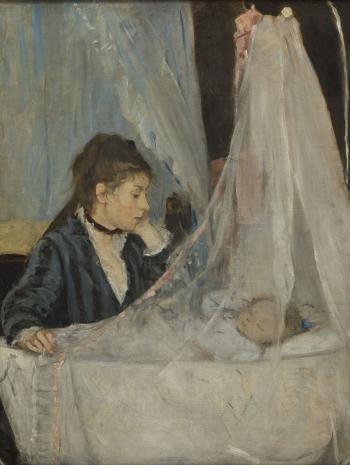 jeune femme près d'un berceau avec un nourrisson