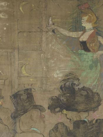 des spectateurs de dos regardent une danseuse