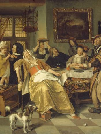 On voit le jeune roi ou prince boire avec les cuisinier dans la cuisine réservée aux employés