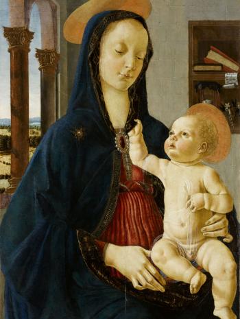 La Vierge, portant sur ses genoux Jésus, qui lui tire la capuche de son scapulaire bleu