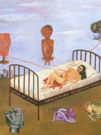 femme sur un lit d'hôpital